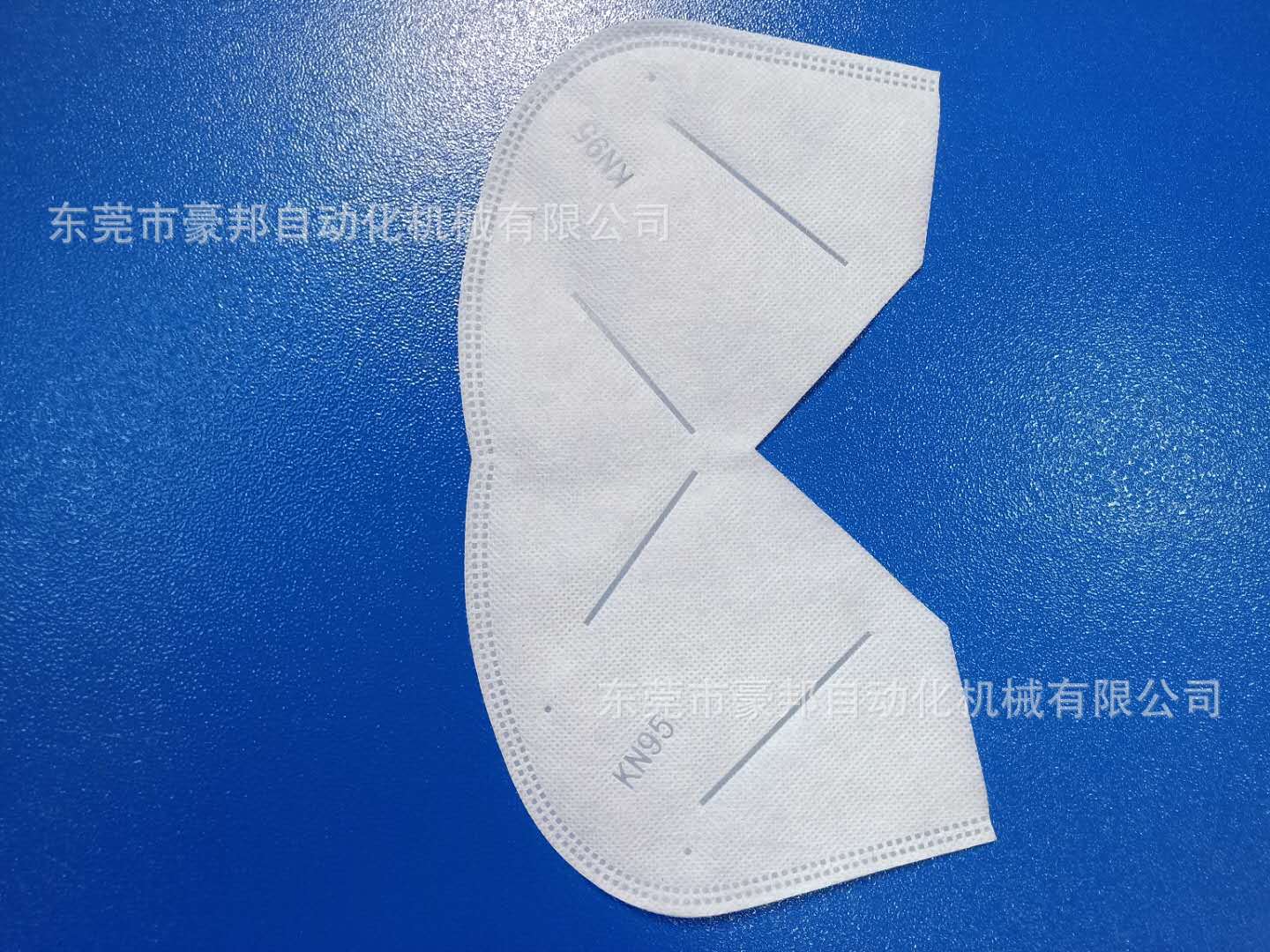 KN95口罩打片机KN95折叠口罩滚片机口罩C型超声波滚切机生产厂家